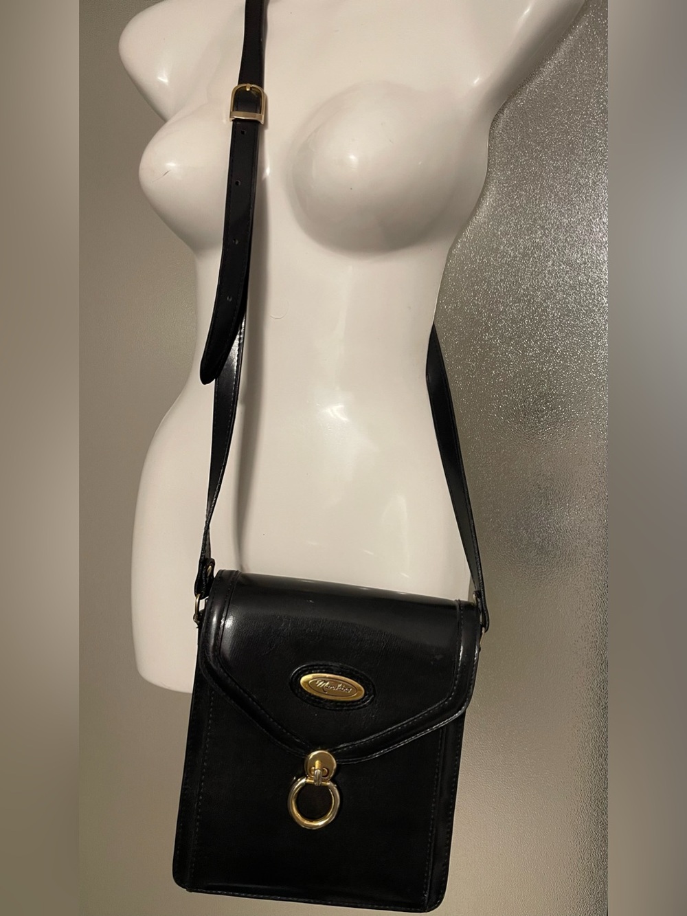 Vintage Marchino Italian Black Leather Crossbody with Gold Ring Accent